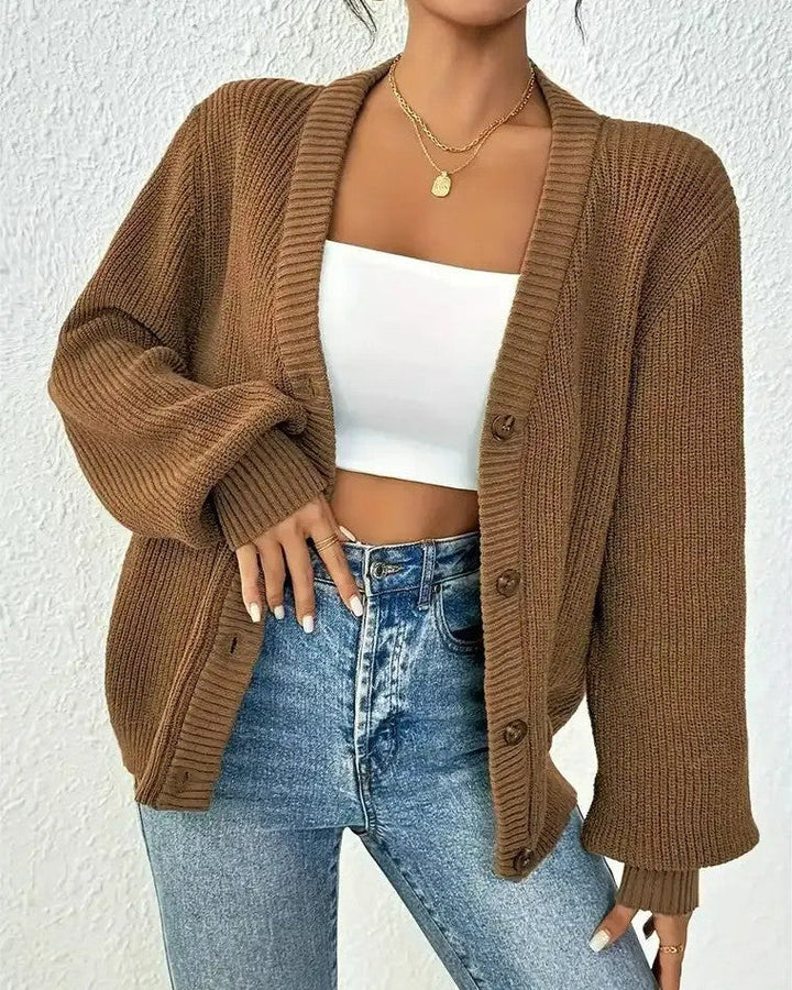Damen Gerippte Strickjacke mit V-Ausschnitt Knopfverschluss und Ballonärmeln