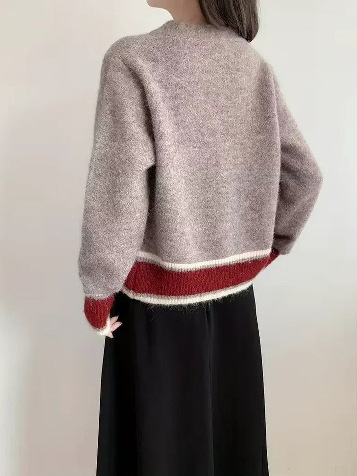 Damen Langarm Strickjacke mit V-Ausschnitt und Drei-Knopf-Leiste in melierter Oberfläche