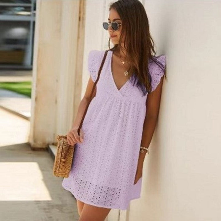 Karen – Sommerkleid mit V-Ausschnitt aus Baumwolle und kurzem Rock in einheitlicher Farbe